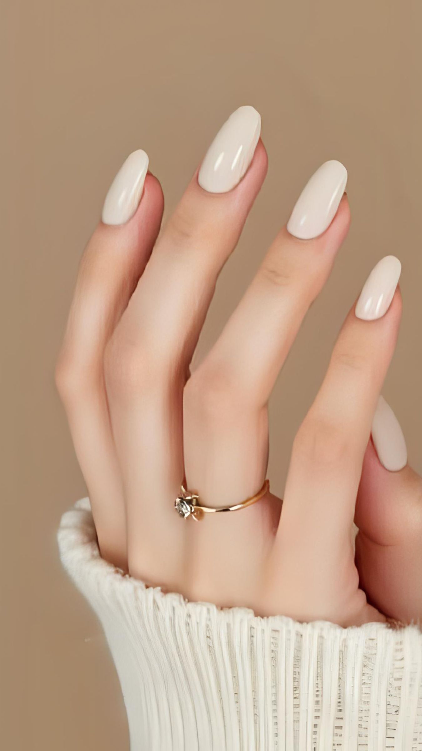 Chic Milky Beige Oval Nails: Elegant & Minimalist Manicure Ideas