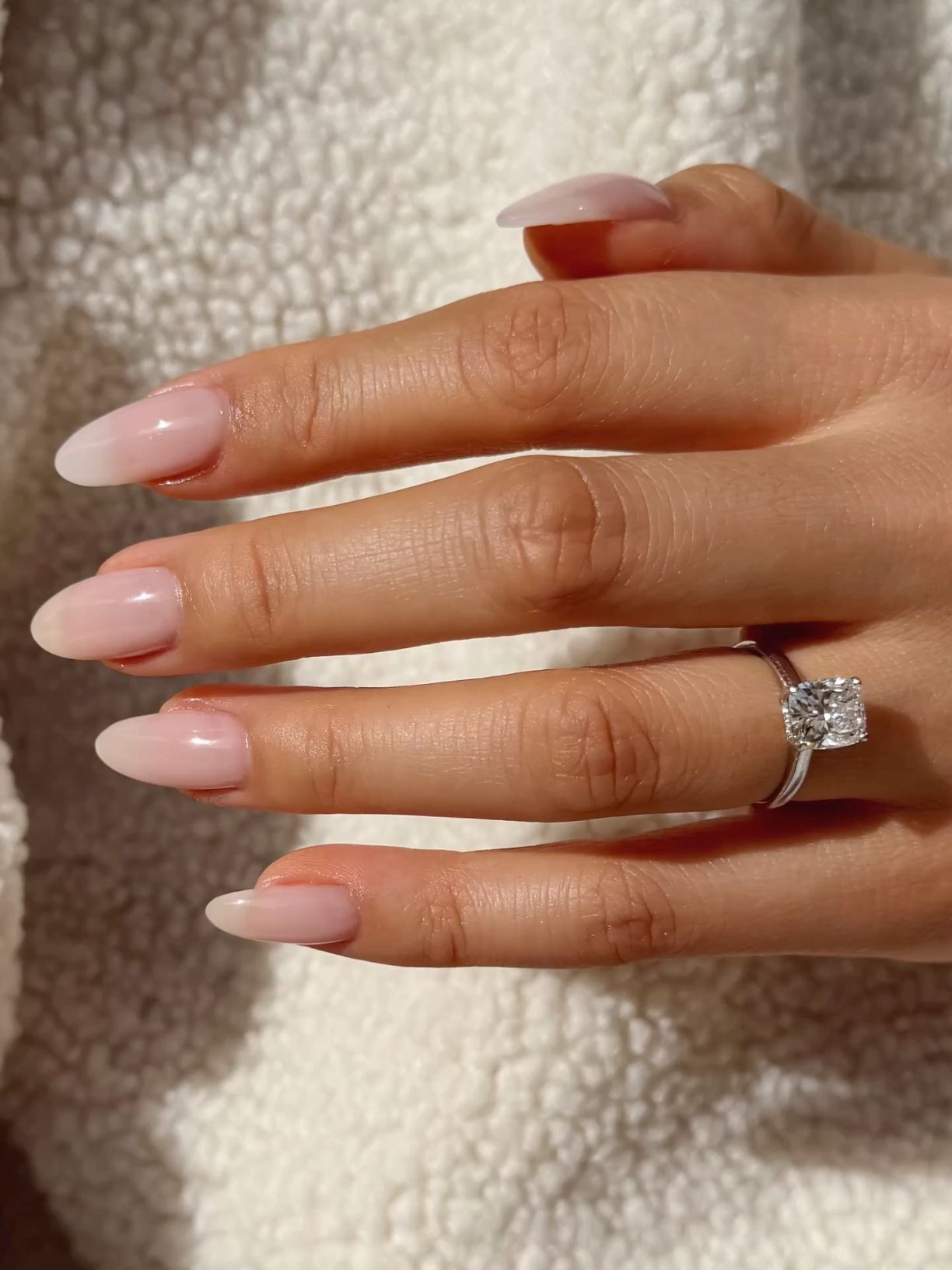 Glossy Milky Pink Almond Nails: Subtle French Fade Manicure