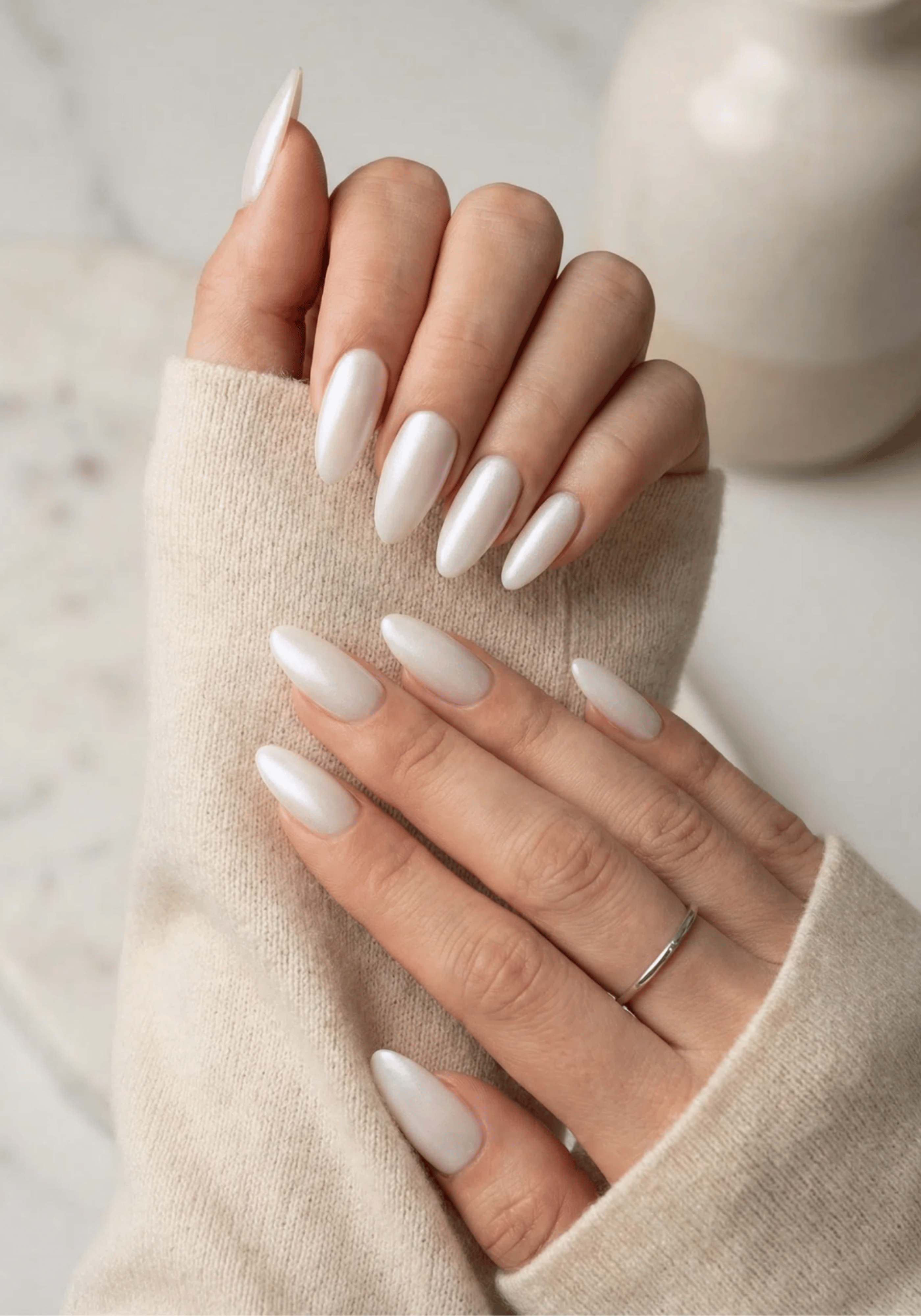 Chic Pearlescent Milky White Almond Nails for a Polished Look