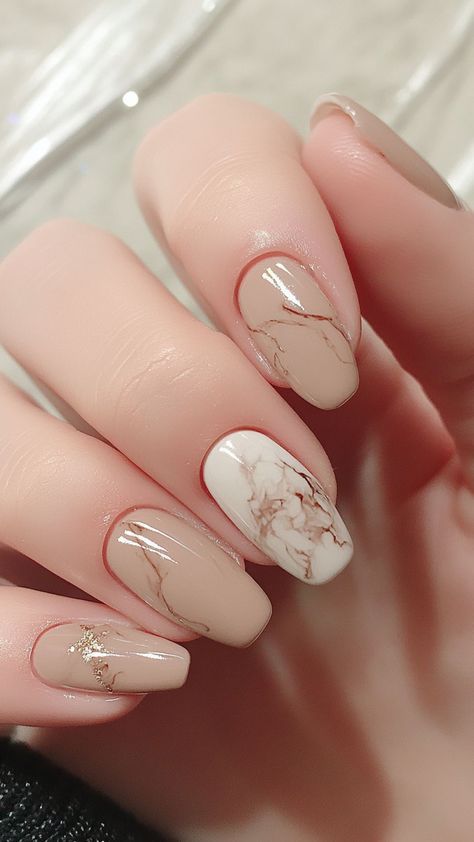 Sophisticated Beige Marble & White Manicure with Gold Accents