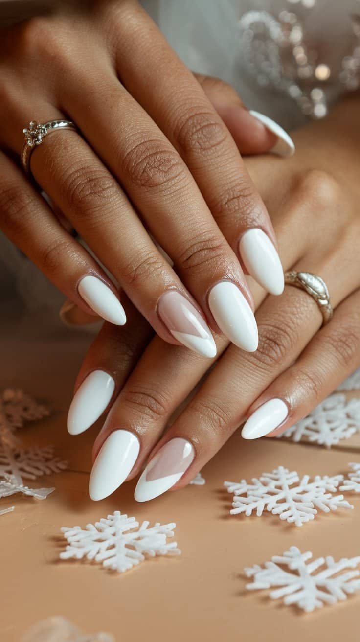 Elegant White Almond Nails with Geometric Nude & White Accent