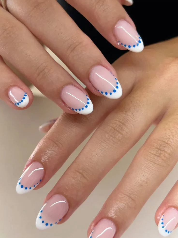 Blue Polka Dot French Tip Nails: Playful & Chic Oval Mani