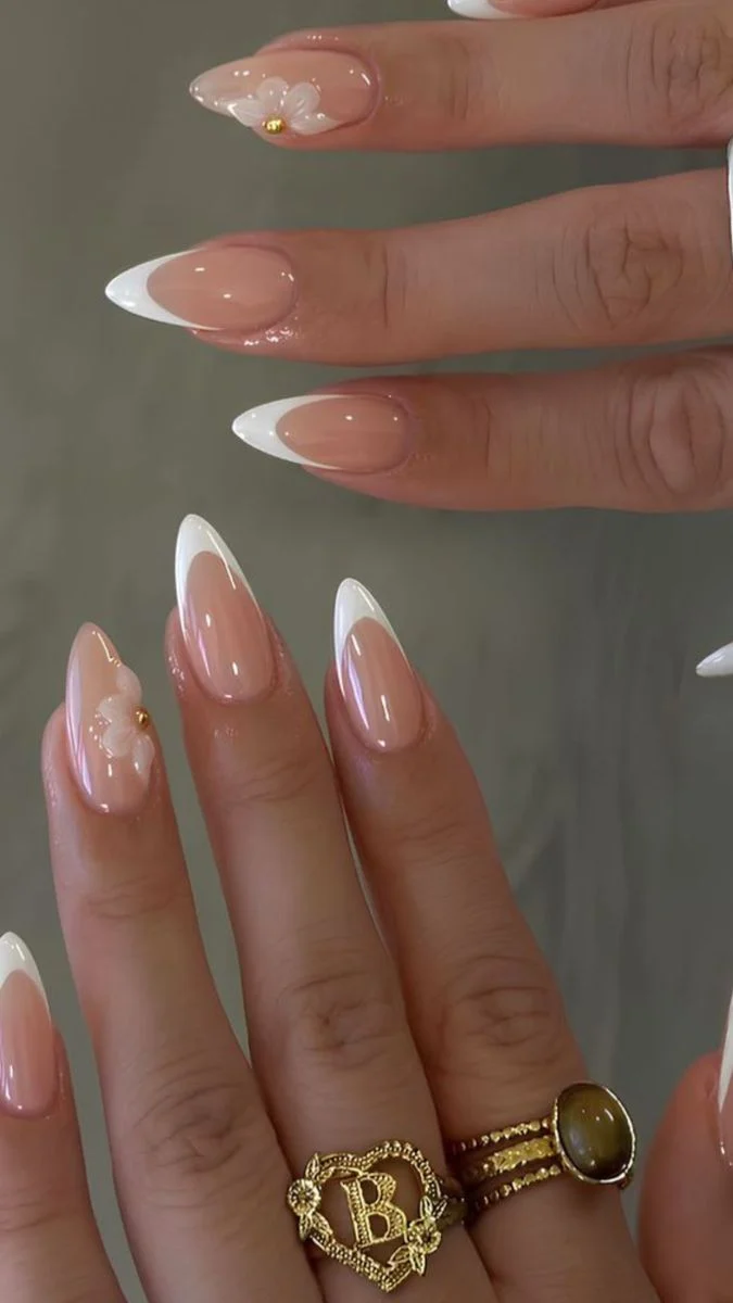Elegant Almond French Tip Nails with 3D Flower Accent