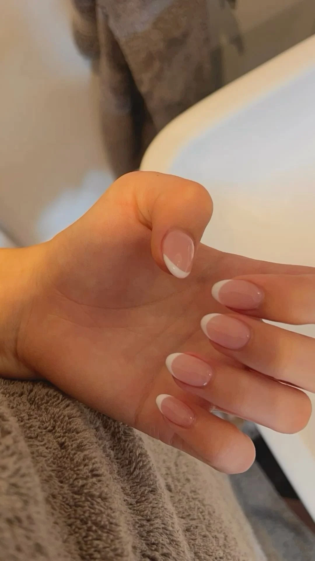 Classic French Manicure: Elegant Nude & White Oval Nails