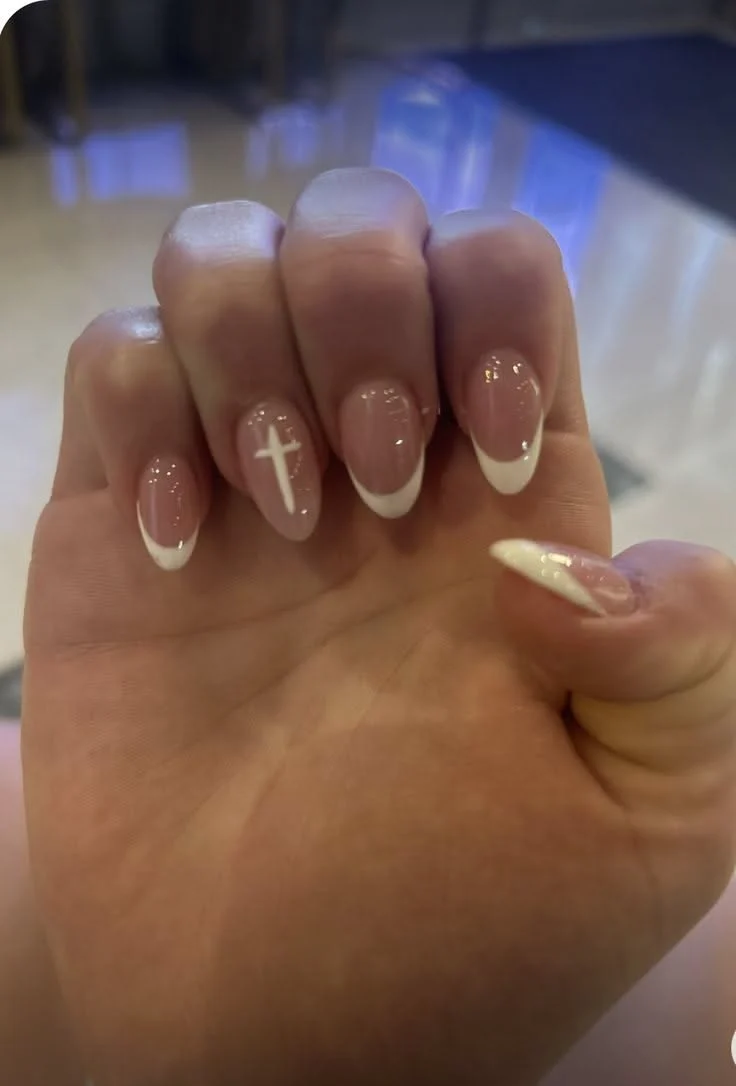 Elegant Nude French Tip Nails with White Cross Design