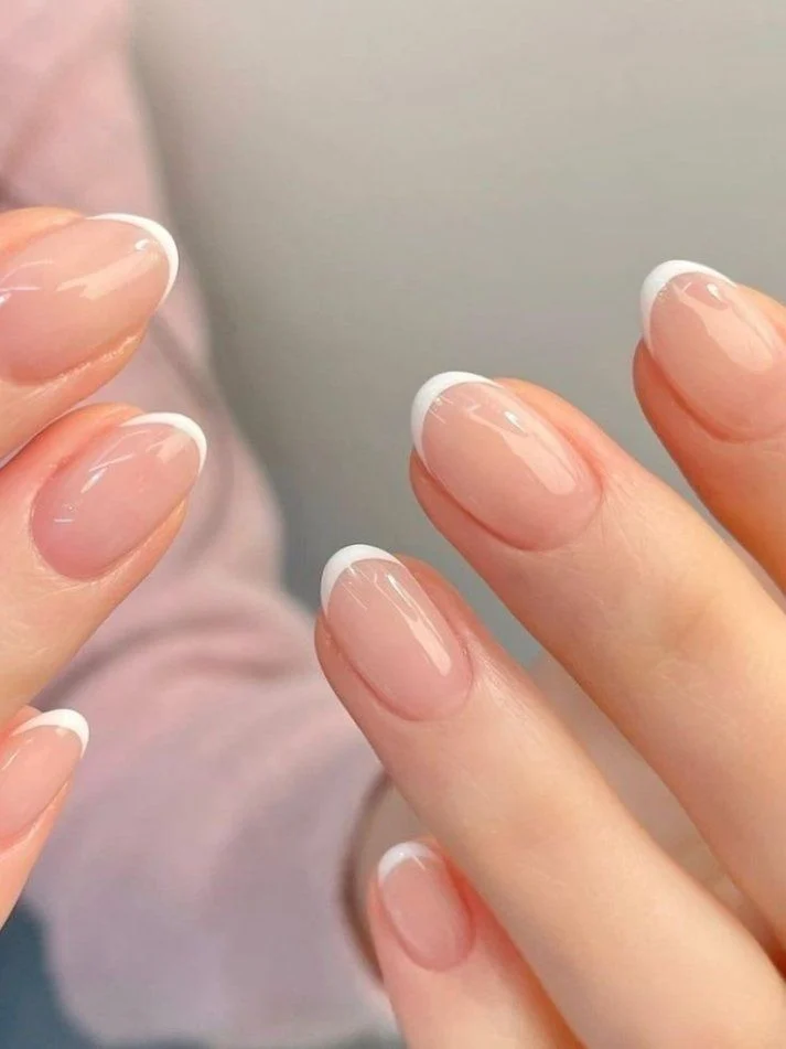 Classic French Manicure on Oval Nails: Timeless & Elegant